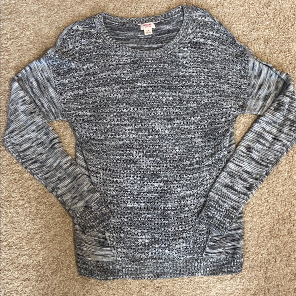 Grey, white, and black sweater